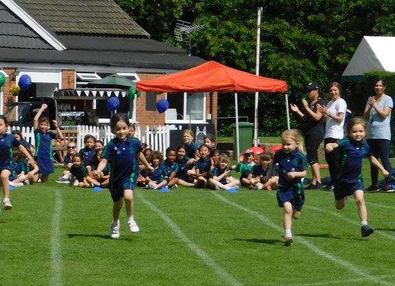 Girls competing on sports day